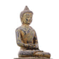 A serene gilt bronze statue of Gautama Buddha