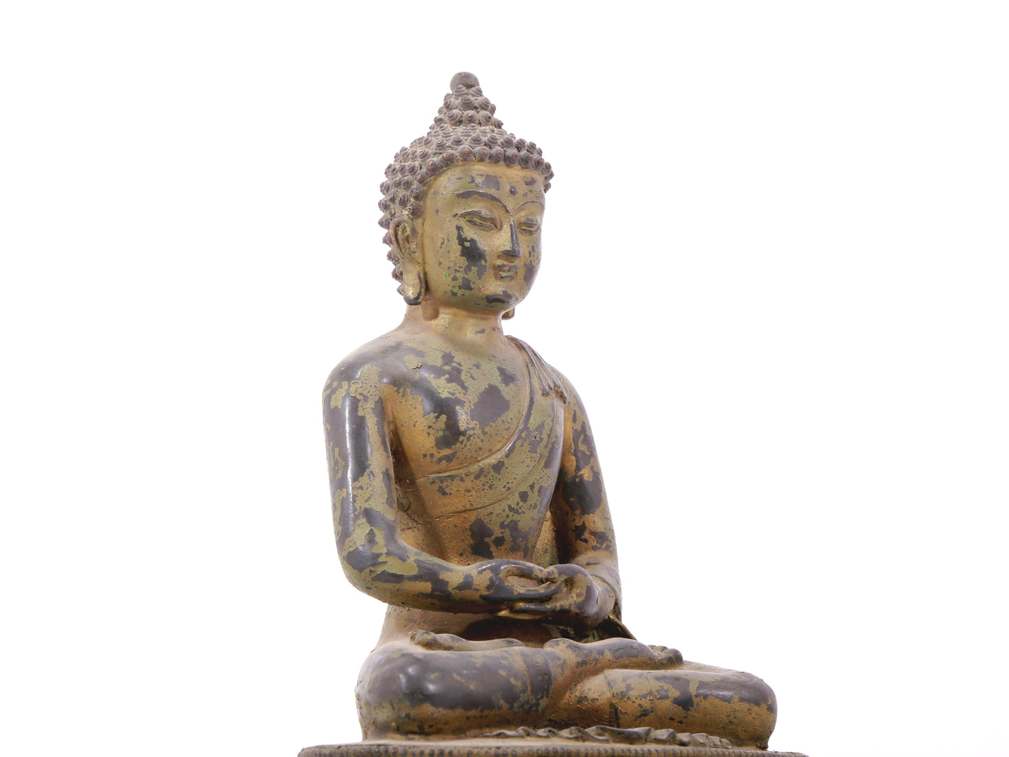 A serene gilt bronze statue of Gautama Buddha