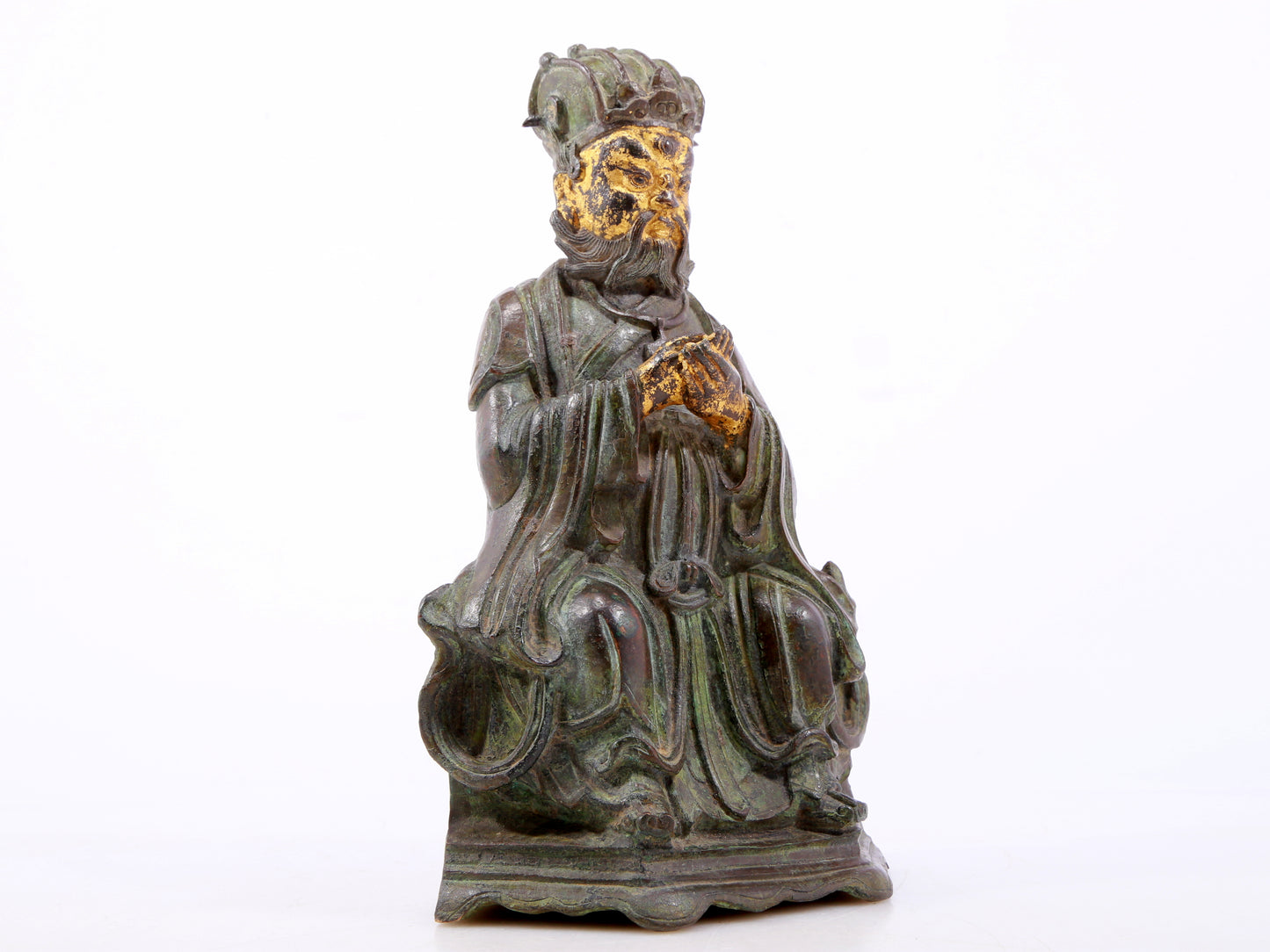 A serene gilt bronze figure