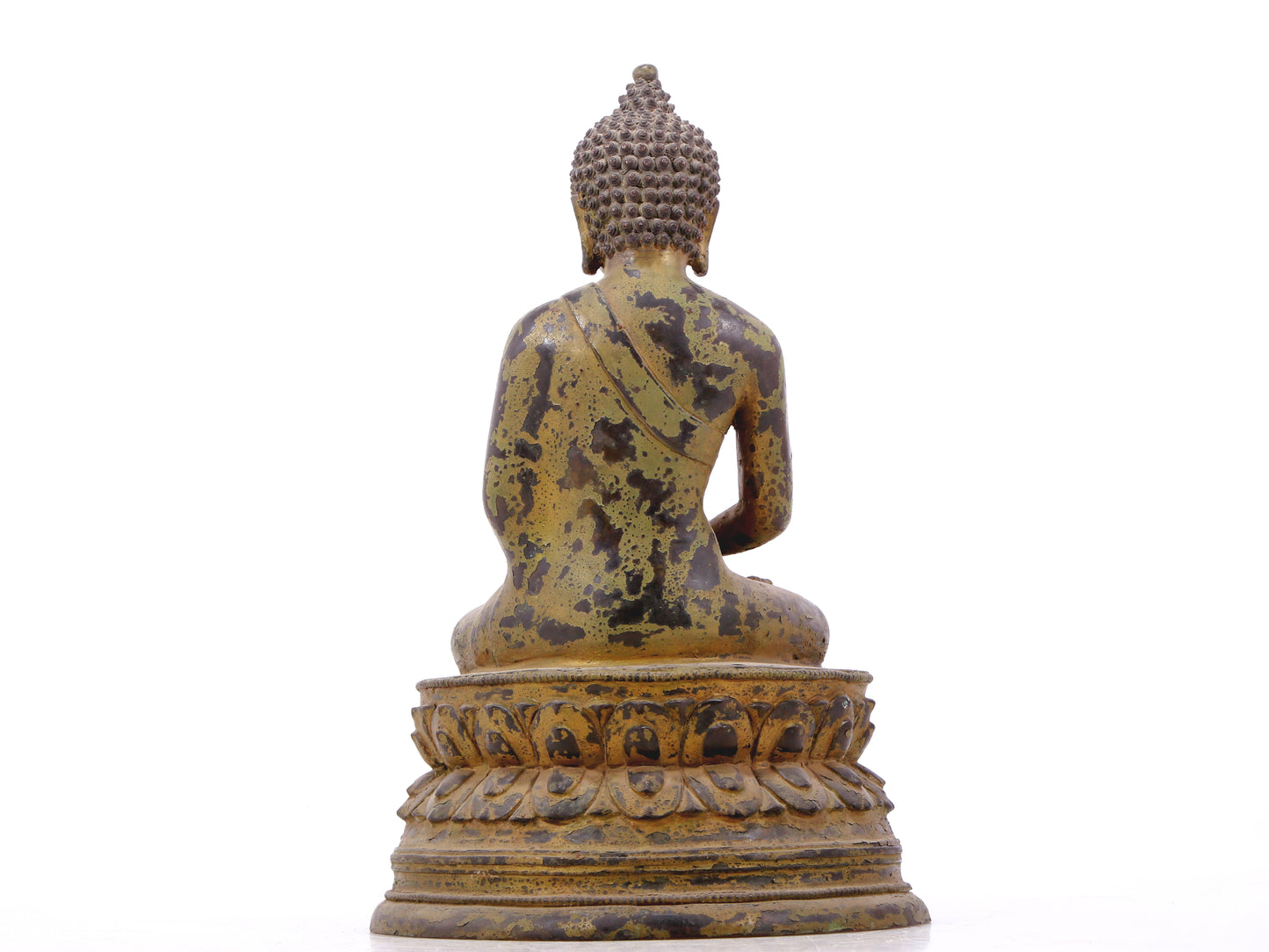 A serene gilt bronze statue of Gautama Buddha