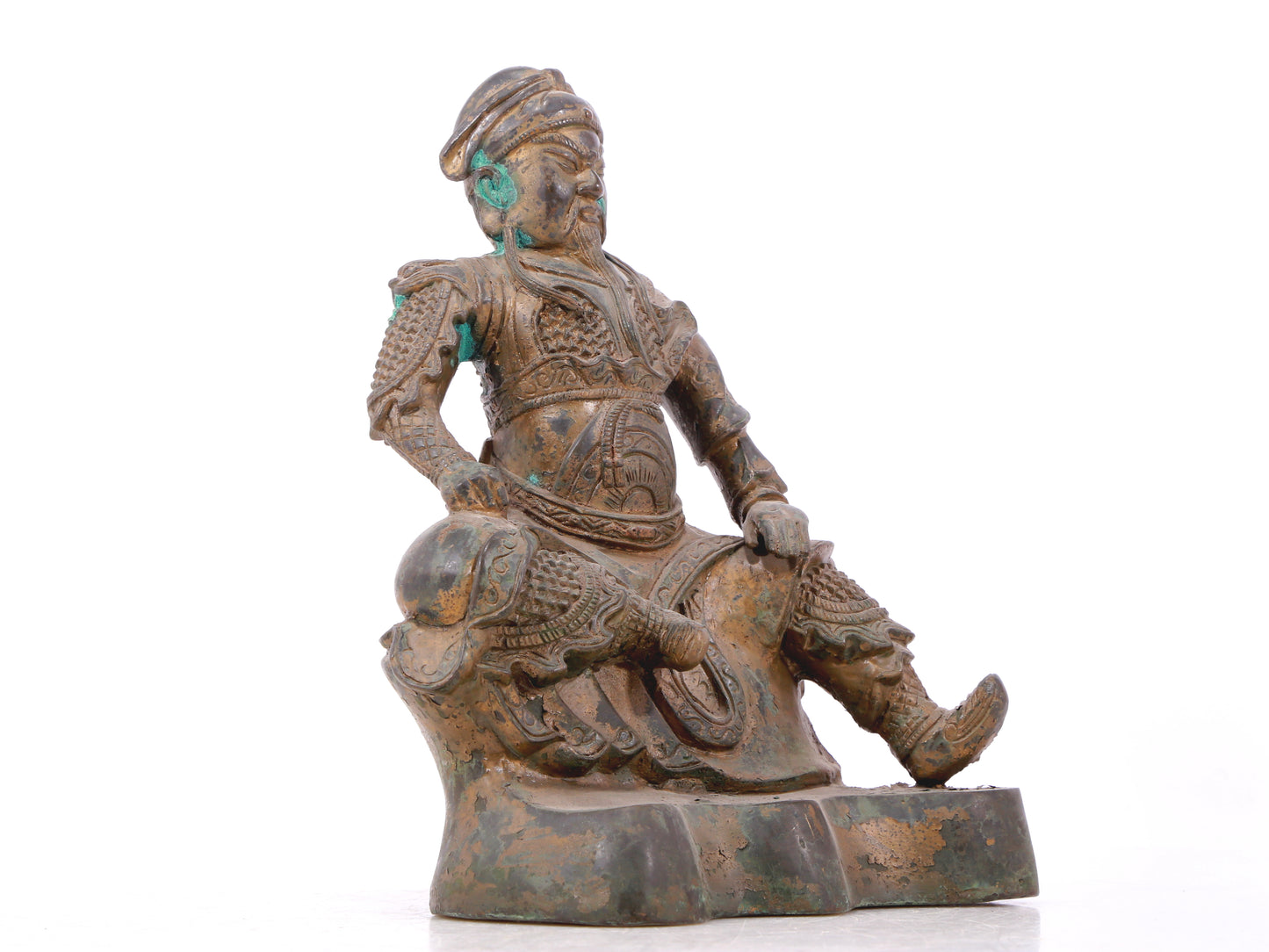 A serene gilt bronze statue of Guan Gong