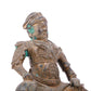 A serene gilt bronze statue of Guan Gong