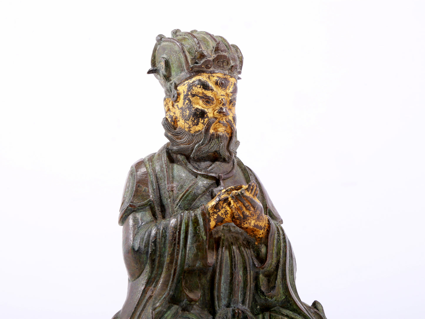 A serene gilt bronze figure