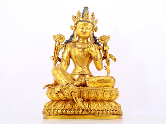 A stunning gilt bronze green Tara statue