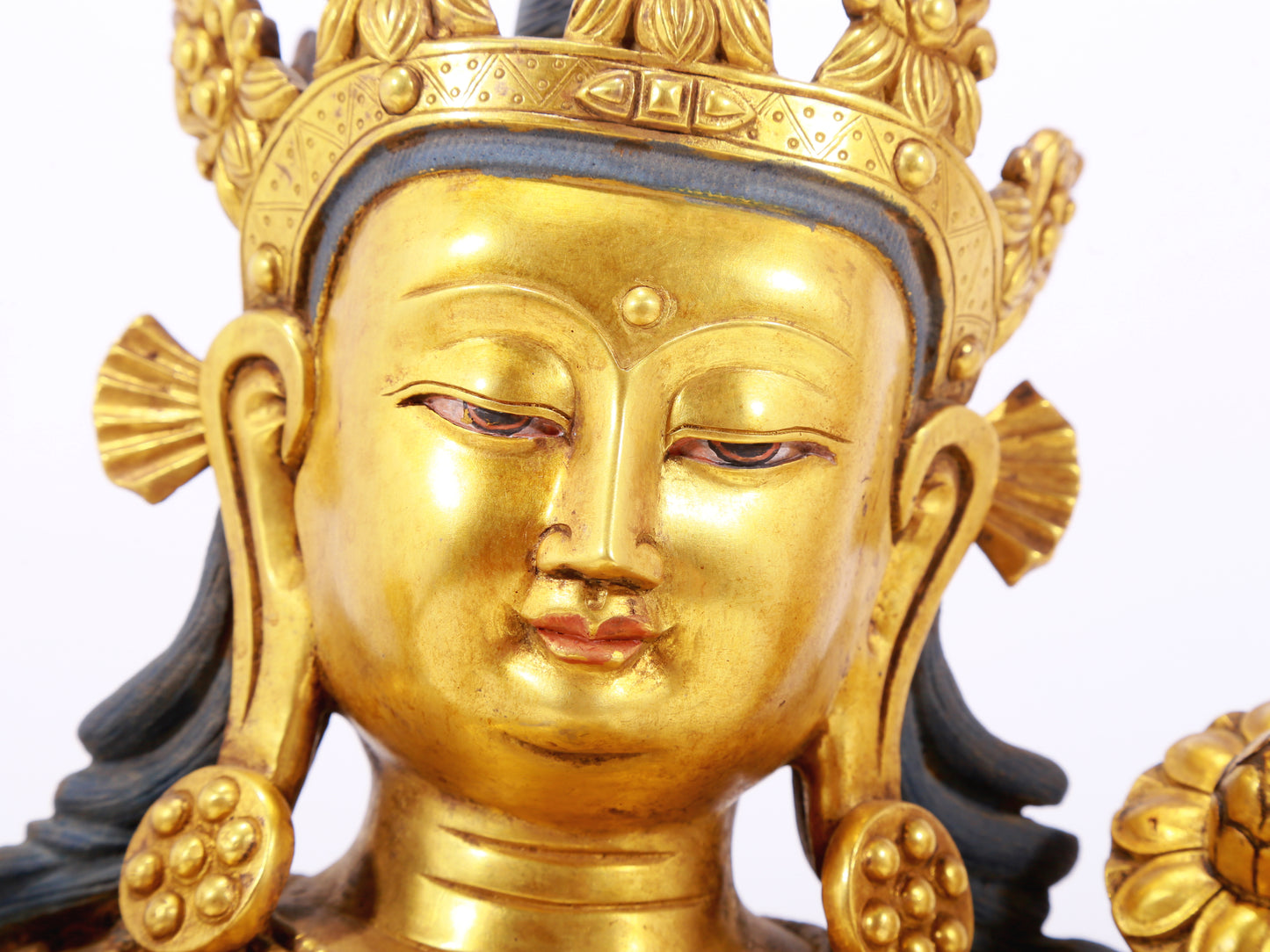 A stunning gilt bronze green Tara statue