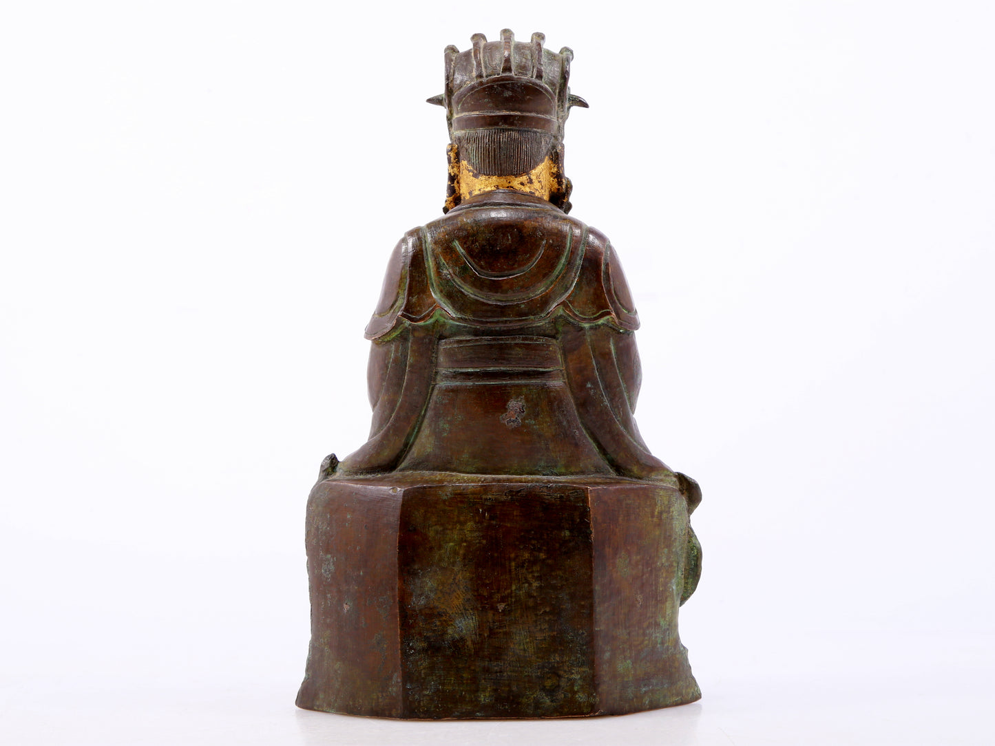 A serene gilt bronze figure