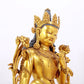 A stunning gilt bronze green Tara statue