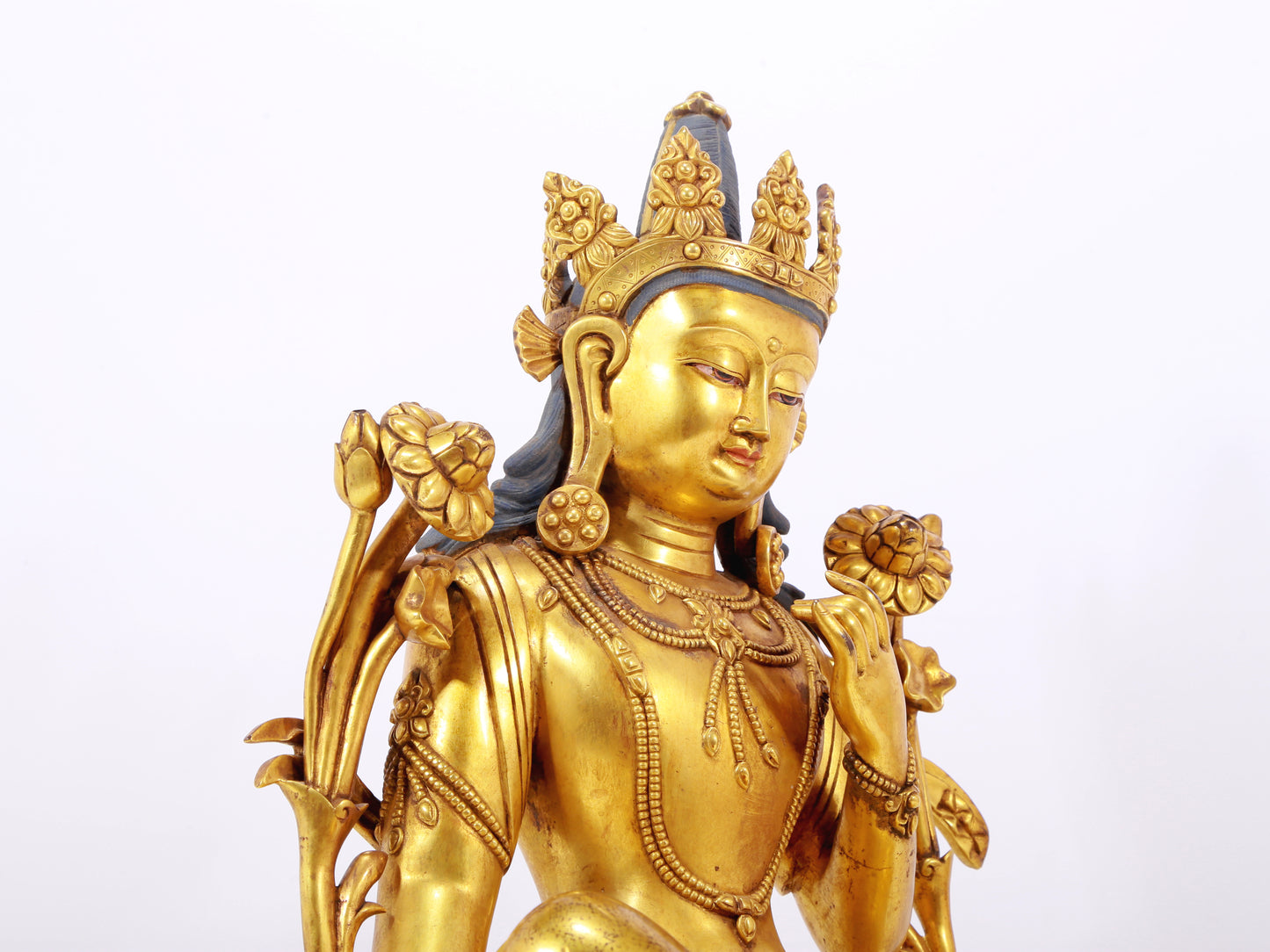 A stunning gilt bronze green Tara statue