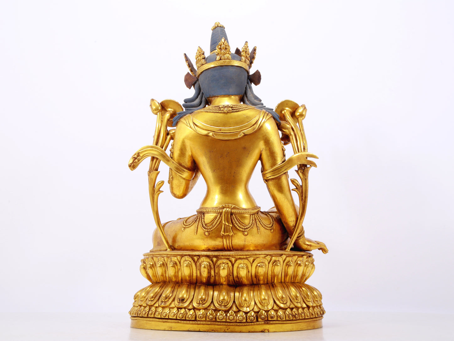 A stunning gilt bronze green Tara statue