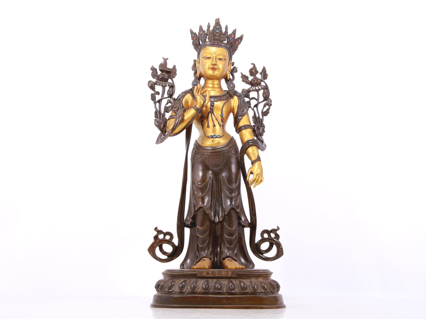 A stunning gilt bronze statue of Manjushri Bodhisattva