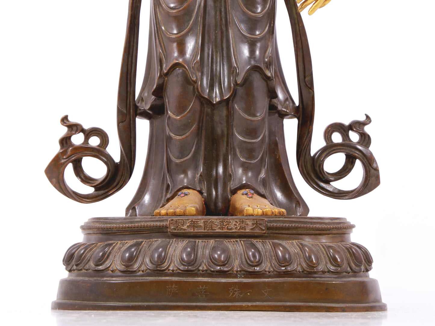 A stunning gilt bronze statue of Manjushri Bodhisattva
