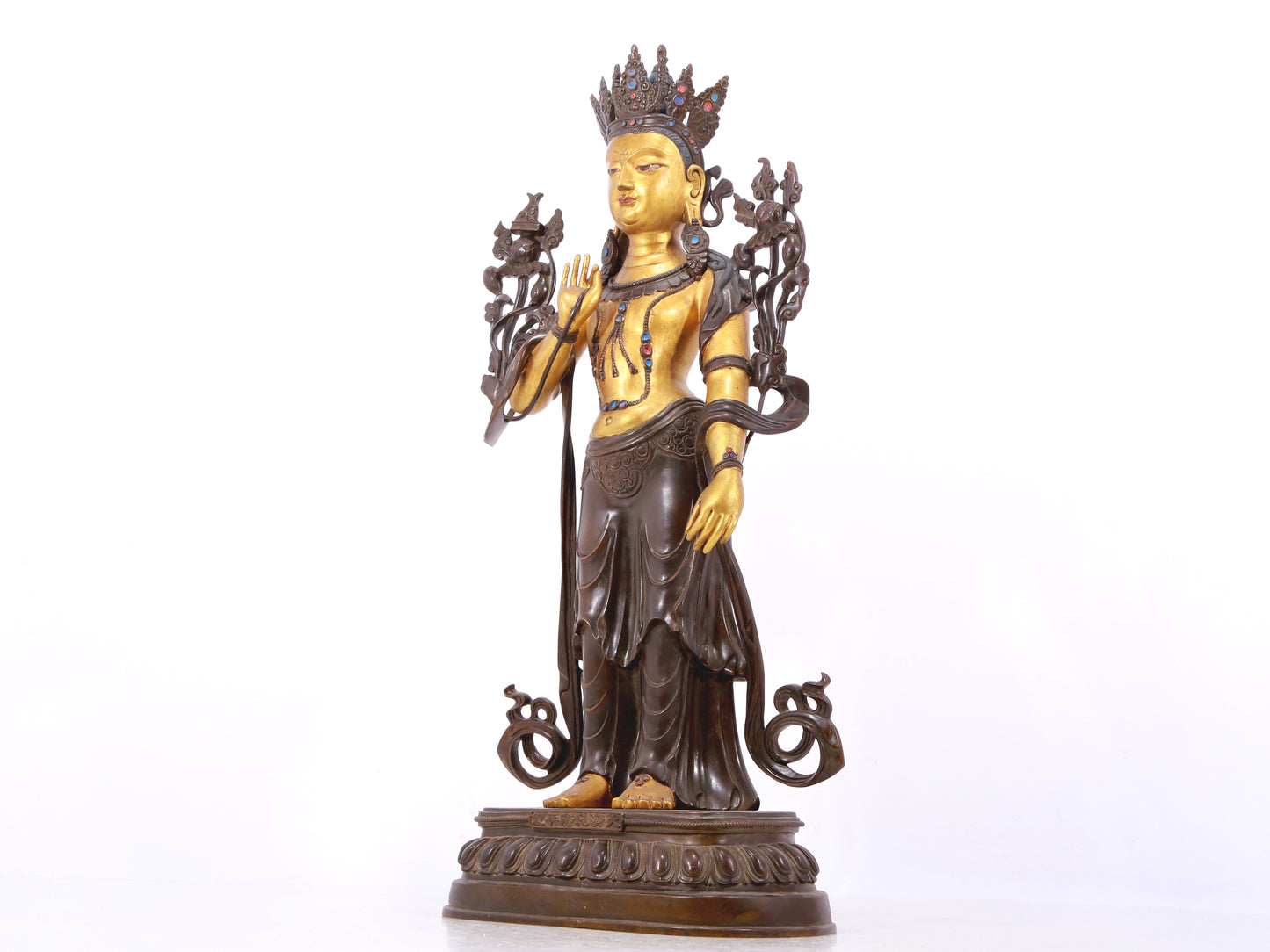 A stunning gilt bronze statue of Manjushri Bodhisattva