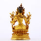 A serene gilt bronze green Tara statue