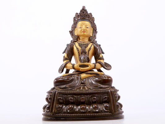 A serene gilt bronze statue of Amitayus Buddha