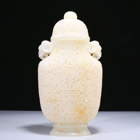 An Elaborate White Jade 'Scrolling Lotus' Elephant-Handled Vase