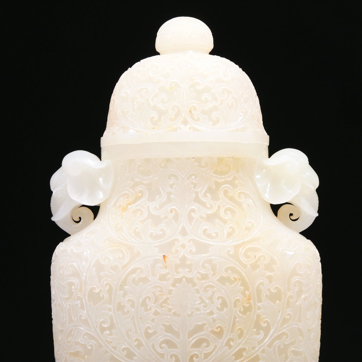 An Elaborate White Jade 'Scrolling Lotus' Elephant-Handled Vase