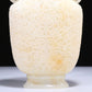 An Elaborate White Jade 'Scrolling Lotus' Elephant-Handled Vase