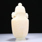 An Elaborate White Jade 'Scrolling Lotus' Elephant-Handled Vase