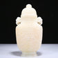 An Elaborate White Jade 'Scrolling Lotus' Elephant-Handled Vase