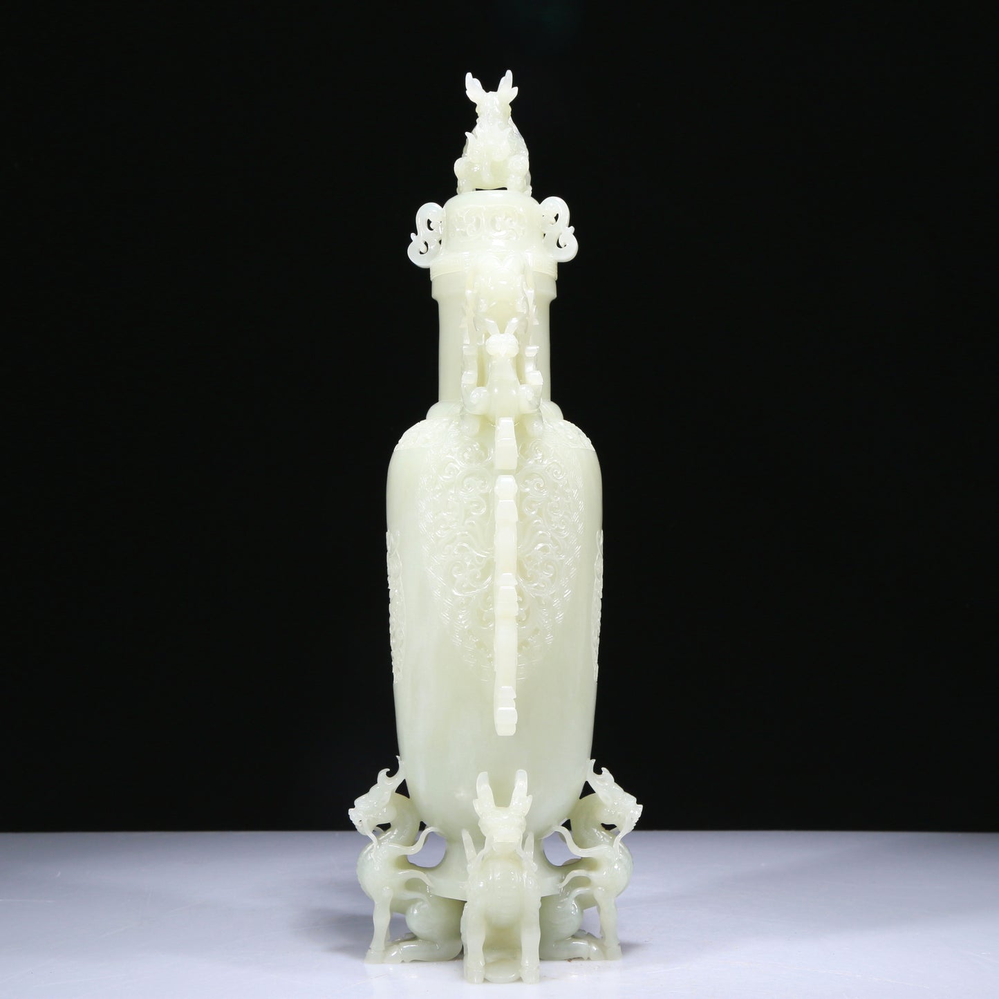 An Elaborate White Jade 'Kylin' Phoenix-Handled Vase