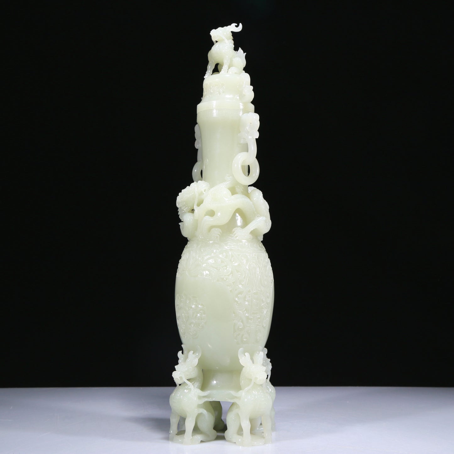 An Elaborate White Jade 'Scrolling Lotus& Dragon' Vase