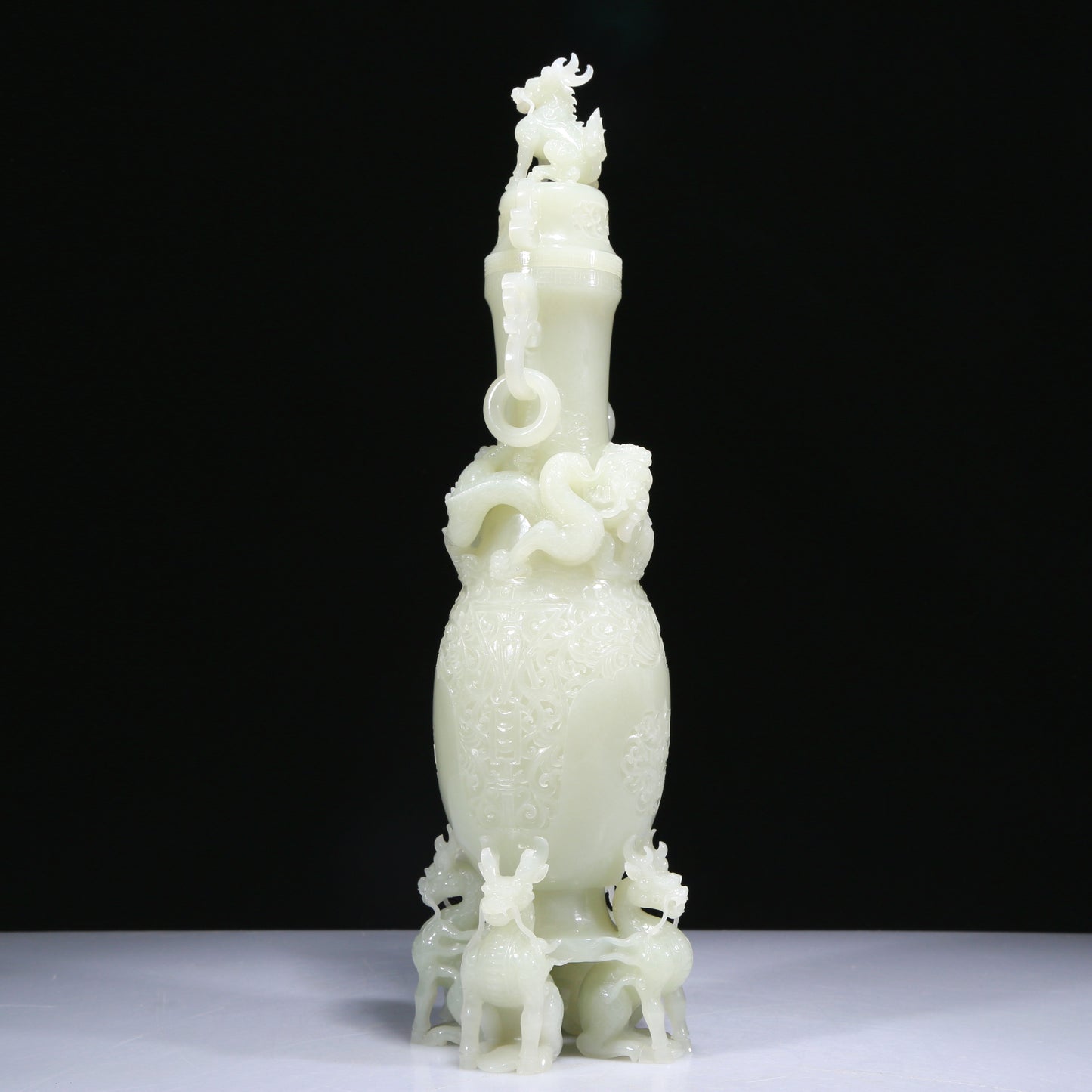 An Elaborate White Jade 'Scrolling Lotus& Dragon' Vase