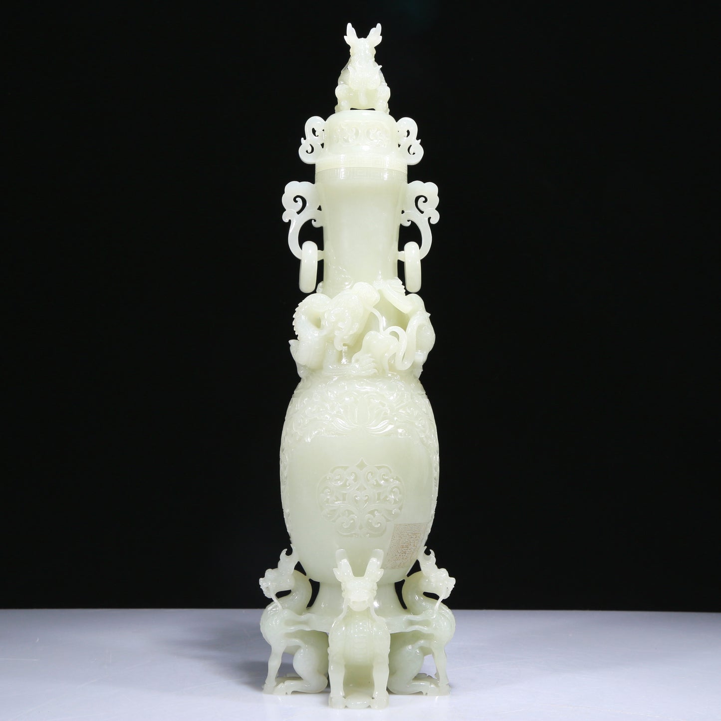 An Elaborate White Jade 'Scrolling Lotus& Dragon' Vase