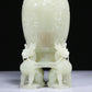 An Elaborate White Jade 'Scrolling Lotus& Dragon' Vase