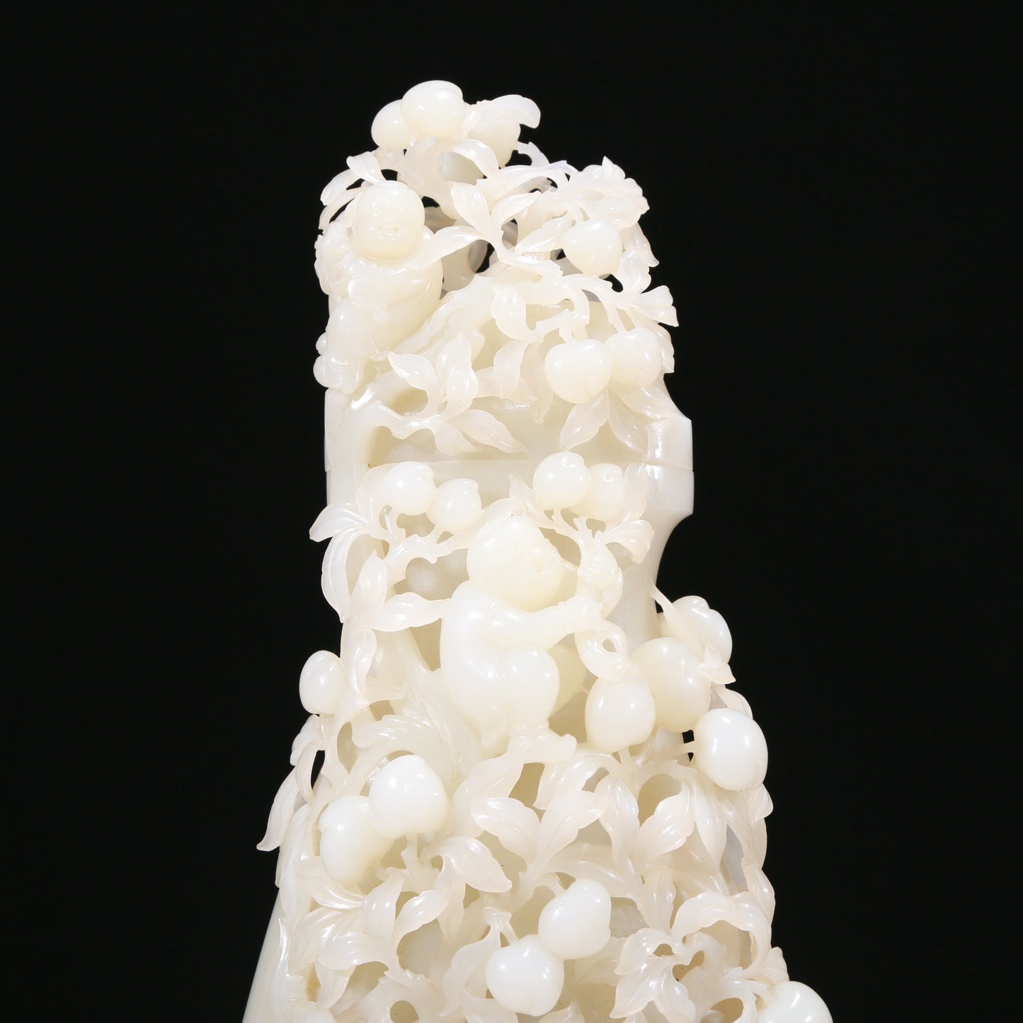 An Elaborate White Jade 'Figures Picking Peaches' Vase With Imperial Poem Inscriptions From Qianlong Period