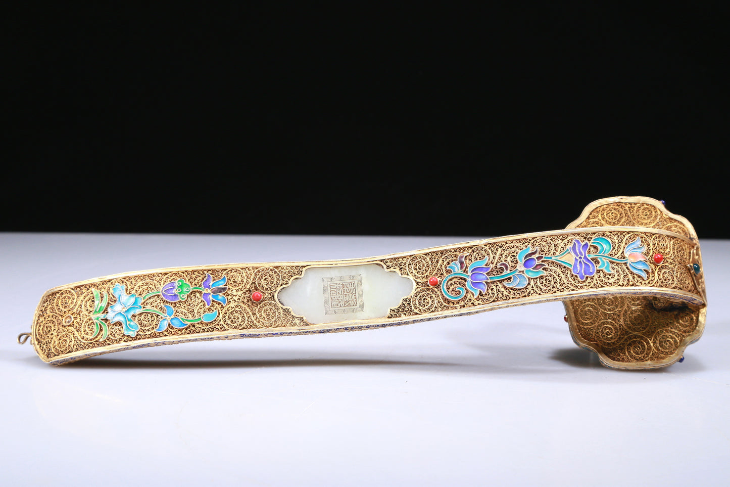 An Elaborate White Jade Gold-Mounted 'Bird& Flower' Ruyi Scepter