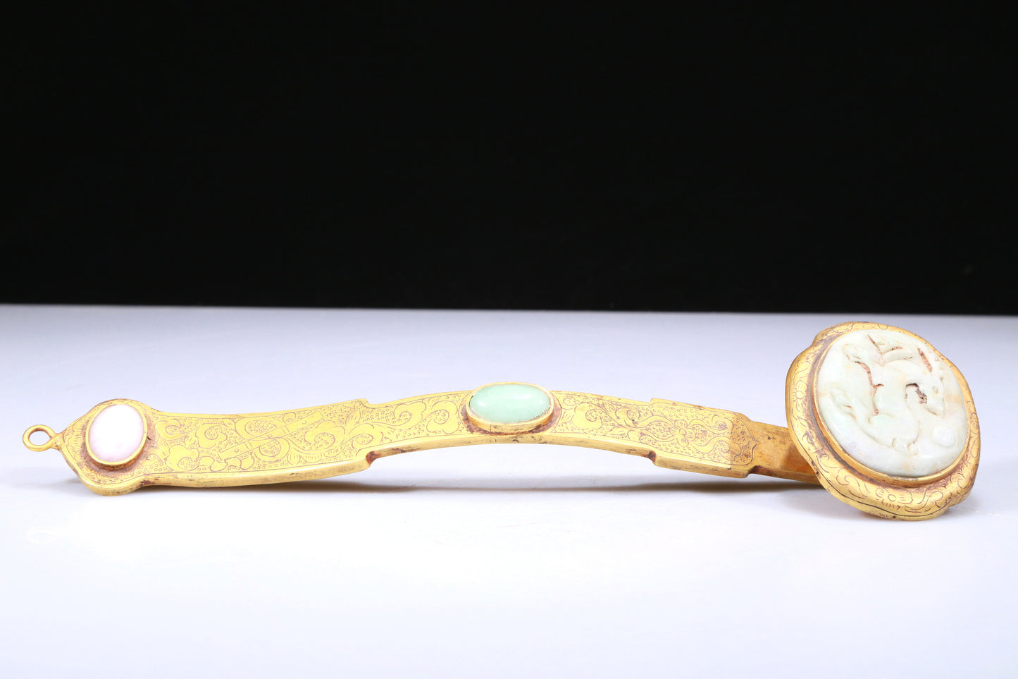 An Elaborate Gilt-Bronze White Jade-Inlaid 'Flower& Deer' Ruyi Scepter