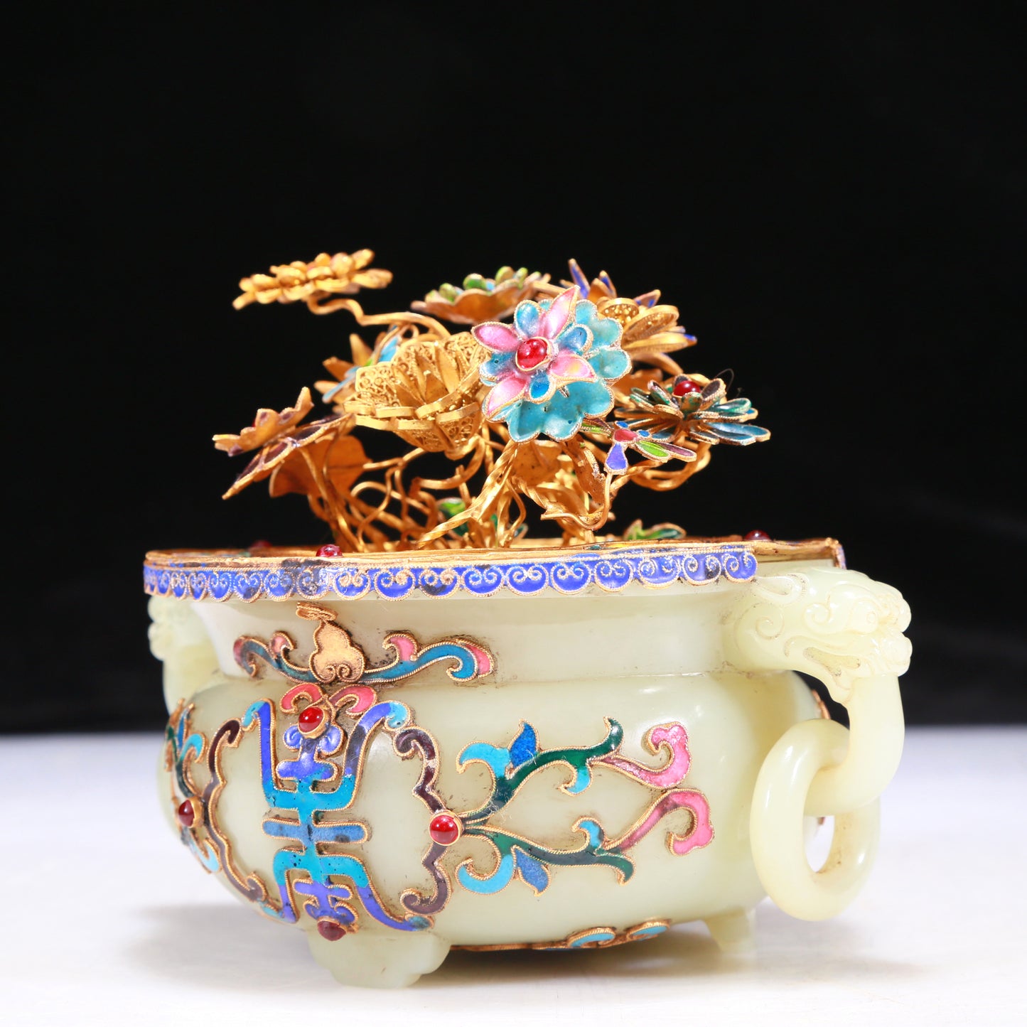 An Elaborate White Jade Gold-Mounted Blueing Tripod Jardiniere