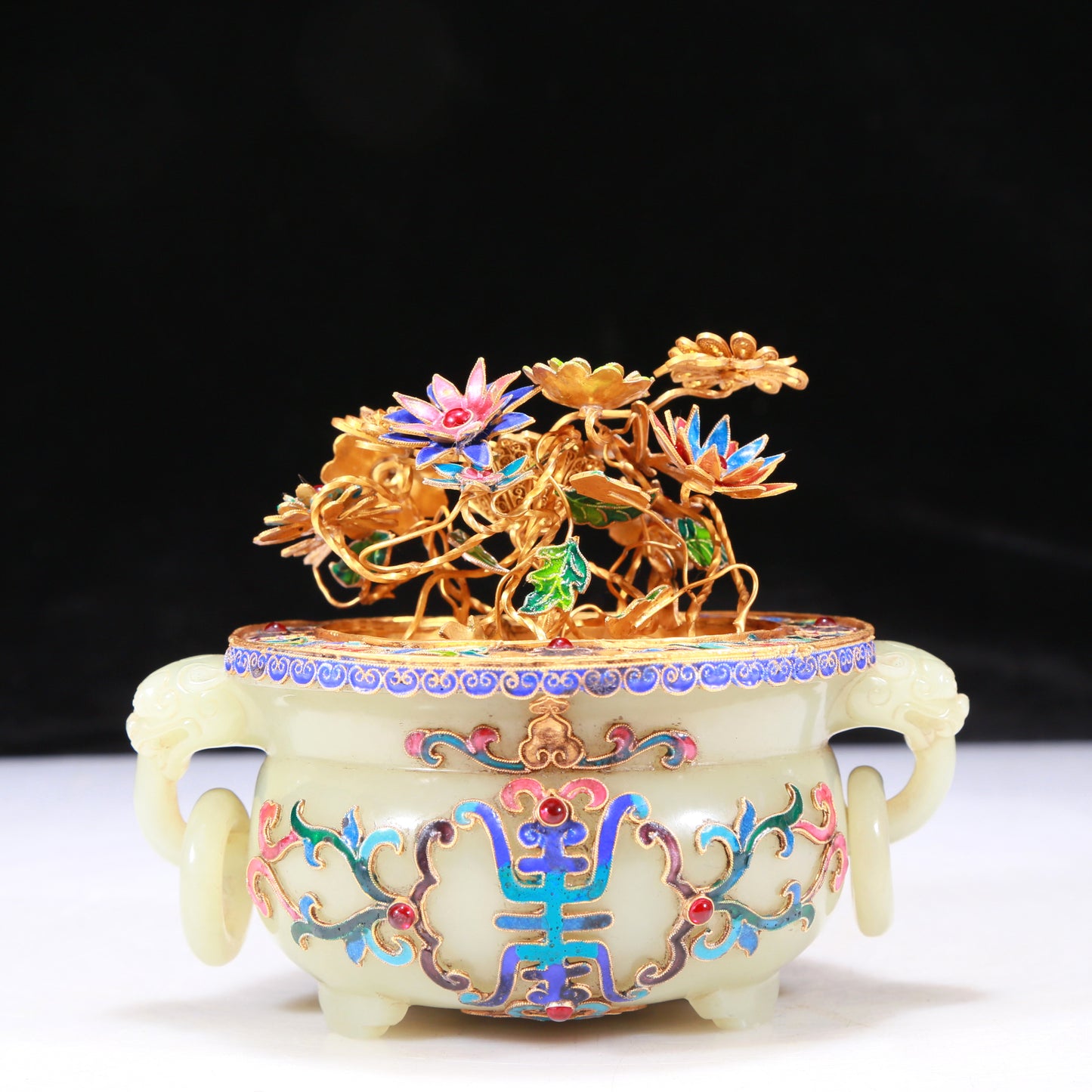 An Elaborate White Jade Gold-Mounted Blueing Tripod Jardiniere