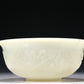 A Marvelous White Jade 'Weapons Of The Eight Immortals' Bowl