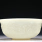 A Marvelous White Jade 'Weapons Of The Eight Immortals' Bowl