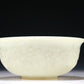 A Marvelous White Jade 'Weapons Of The Eight Immortals' Bowl