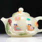 A Superb Imperial White Jade Gem-Inlaid 'Bird& Flower' Teapot