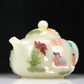 A Superb Imperial White Jade Gem-Inlaid 'Bird& Flower' Teapot