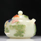 A Superb Imperial White Jade Gem-Inlaid 'Bird& Flower' Teapot