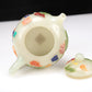 A Superb Imperial White Jade Gem-Inlaid 'Bird& Flower' Teapot