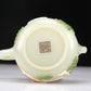 A Superb Imperial White Jade Gem-Inlaid 'Bird& Flower' Teapot