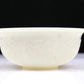 An Excellent White Jade 'Weapons Of The Eight Immortals' Bowl