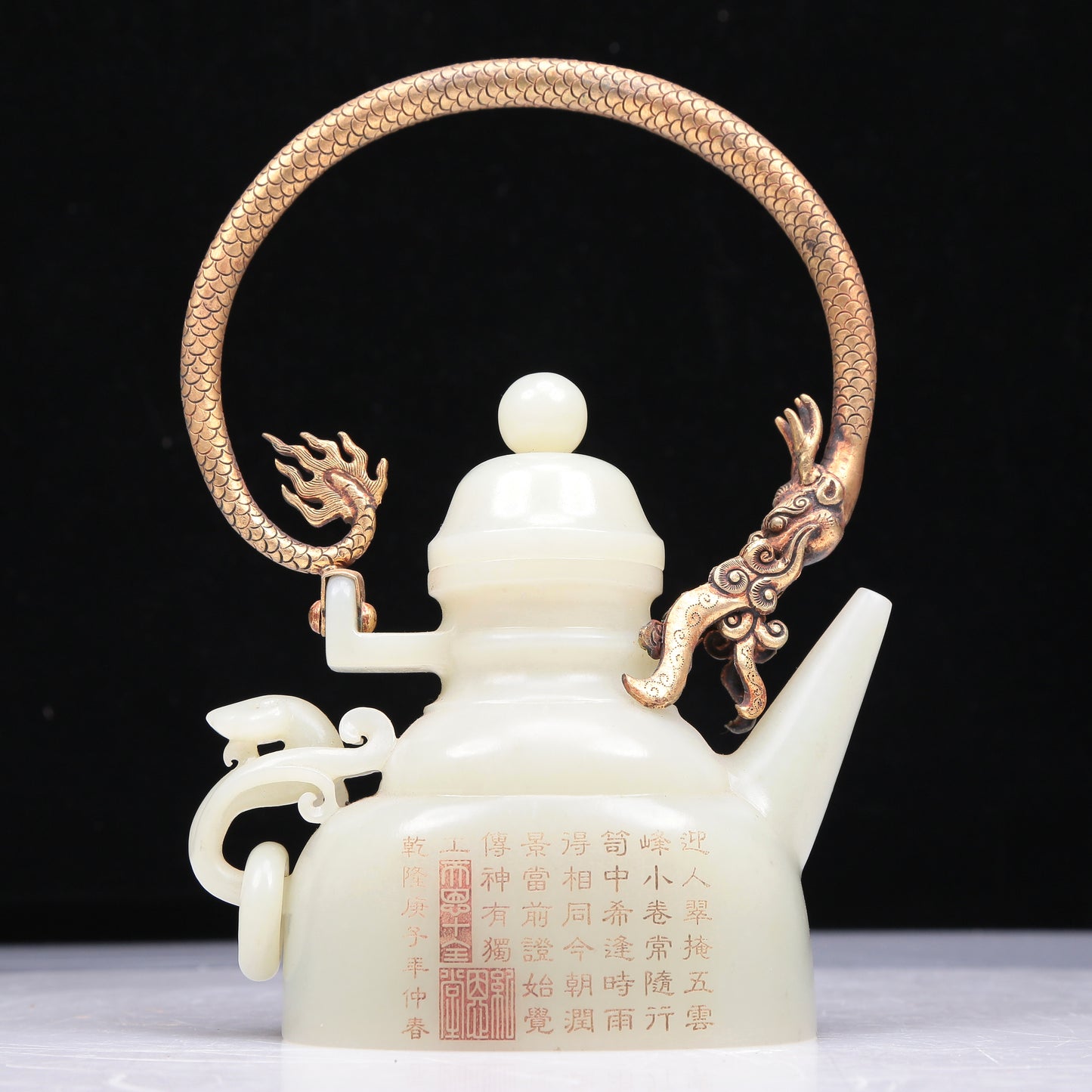 An Excellent White Jade 'Poem' Teapot With A Gilt-Bronze 'Dragon' Overhead Handle And Stand