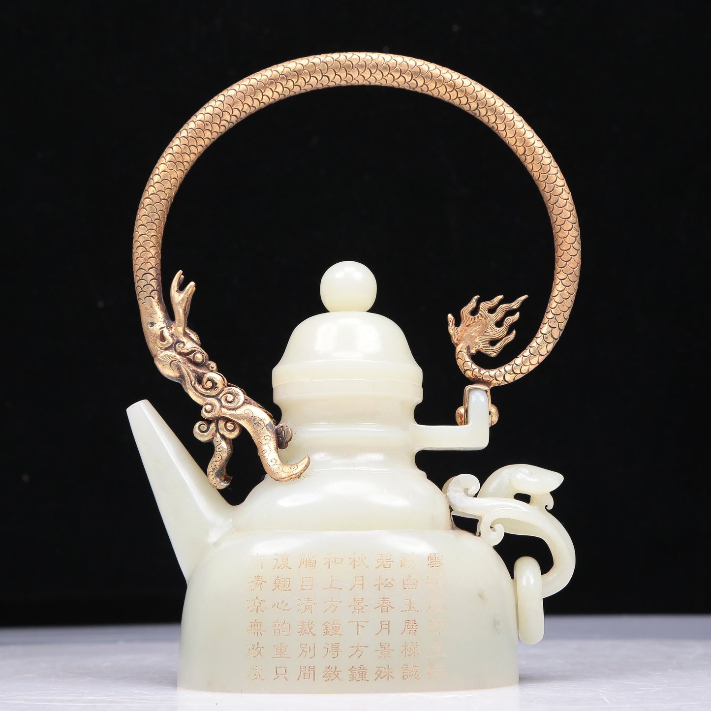 An Excellent White Jade 'Poem' Teapot With A Gilt-Bronze 'Dragon' Overhead Handle And Stand