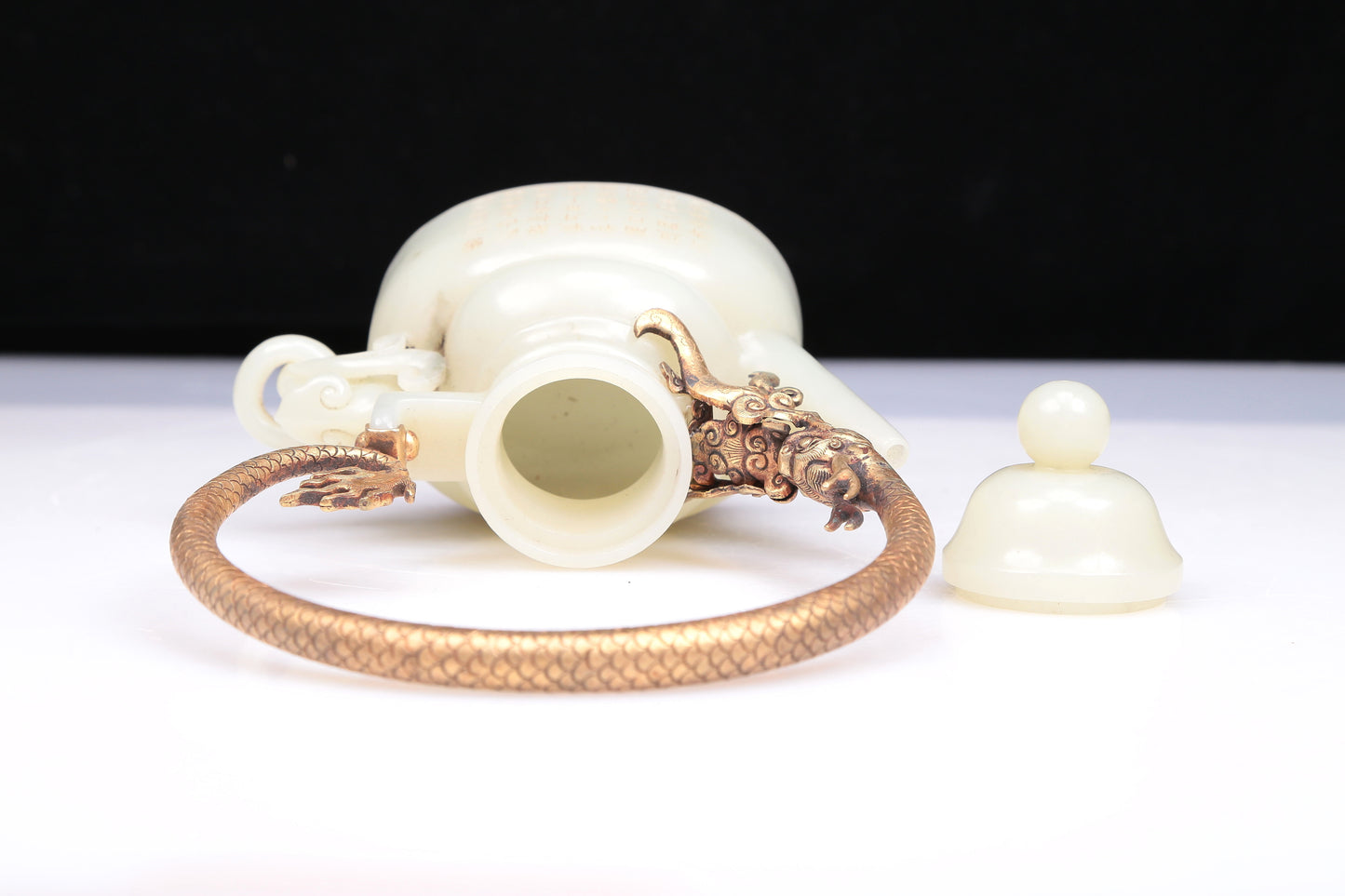 An Excellent White Jade 'Poem' Teapot With A Gilt-Bronze 'Dragon' Overhead Handle And Stand