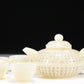 A Brilliant White Jade 'Poem' Teapot With Four Miniature Teacups