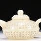 A Brilliant White Jade 'Poem' Teapot With Four Miniature Teacups