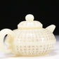 A Brilliant White Jade 'Poem' Teapot With Four Miniature Teacups