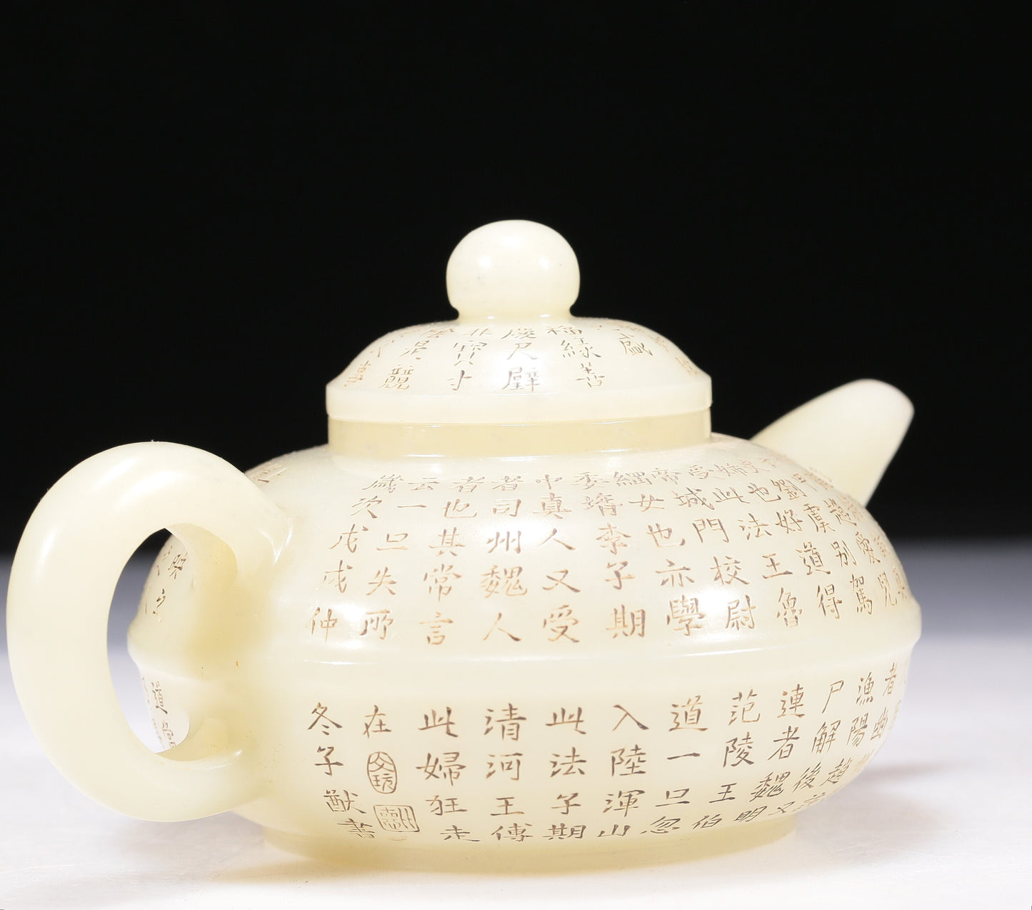 A Brilliant White Jade 'Poem' Teapot With Four Miniature Teacups