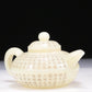 A Brilliant White Jade 'Poem' Teapot With Four Miniature Teacups